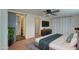 Spacious bedroom with a king-size bed and built-in wardrobe at 2937 E Osborn Rd, Phoenix, AZ 85016