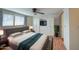 Bright bedroom featuring a king-size bed and plenty of closet space at 2937 E Osborn Rd, Phoenix, AZ 85016
