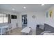 Bright living room with sofa, coffee table, and dining area at 2937 E Osborn Rd, Phoenix, AZ 85016