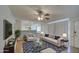 Living room with beige couch and blue pillows at 2937 E Osborn Rd, Phoenix, AZ 85016
