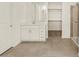 Bathroom with a white vanity, large mirror, and a glass-enclosed shower at 37073 W La Paz St, Maricopa, AZ 85138