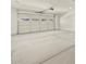 Spacious two-car garage with high ceilings and automatic door at 37073 W La Paz St, Maricopa, AZ 85138