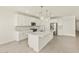 Contemporary kitchen design featuring stainless steel appliances, quartz countertops, and pendant lighting at 37073 W La Paz St, Maricopa, AZ 85138