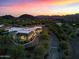 Beautiful home with mountain and city views at sunset at 37956 N School House Rd, Cave Creek, AZ 85331