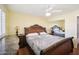 Main bedroom with large bed and mirrored closet at 4016 W Myrtle Ave, Phoenix, AZ 85051
