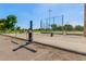 Electric vehicle charging station in community parking area at 4016 W Myrtle Ave, Phoenix, AZ 85051
