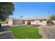 Single-story house with a well-maintained lawn and walkway at 4016 W Myrtle Ave, Phoenix, AZ 85051