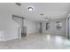 Bright living room with tile floors, stairs, and sliding glass doors at 4159 E Pony Ln, Gilbert, AZ 85295