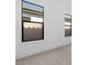 Neutral bedroom with plush carpet, natural light and views to the outdoors at 42104 N Golden Trl, San Tan Valley, AZ 85140