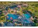 Aerial view of resort-style pool with lap lanes, spa, and lounge areas at 4523 E Rakestraw Ln, Gilbert, AZ 85298