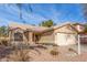 One-story home with a two-car garage and front yard landscaping at 4752 E Lavender Ln, Phoenix, AZ 85044