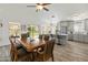 Dining area adjacent to kitchen with wood table and chairs at 49 S Omaha --, Mesa, AZ 85206