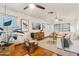 Relaxing living area with hardwood floors and large windows at 5918 W Nancy Rd, Glendale, AZ 85306