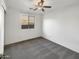 Simple bedroom with neutral wall paint and carpeted floor at 6038 S Connie Ln, Gilbert, AZ 85298