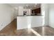 Bright dining area with kitchen views and access to living room at 6038 S Connie Ln, Gilbert, AZ 85298