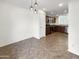 Open dining area with access to kitchen and view to backyard at 6038 S Connie Ln, Gilbert, AZ 85298