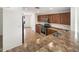 Kitchen with granite countertops and stainless steel appliances at 6038 S Connie Ln, Gilbert, AZ 85298
