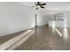 Sunlit living room with tile floors and an open floor plan at 6038 S Connie Ln, Gilbert, AZ 85298