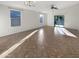 Spacious living room with tile floors and plenty of natural light at 6038 S Connie Ln, Gilbert, AZ 85298