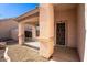 Front entrance with security door and small patio area at 6610 S 25Th Ave, Phoenix, AZ 85041