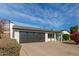 House exterior showcasing a clean, modern design and attractive landscaping at 6808 E Loma Land Dr, Scottsdale, AZ 85257