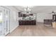 Updated kitchen featuring dark cabinets and granite counters at 6808 E Loma Land Dr, Scottsdale, AZ 85257