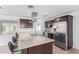 Modern kitchen with stainless steel appliances and granite countertops at 6808 E Loma Land Dr, Scottsdale, AZ 85257