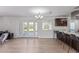 Modern kitchen with granite countertops and bar seating at 6808 E Loma Land Dr, Scottsdale, AZ 85257