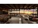 Open living space with expansive windows and sunset views at 7436 E Continental Mountain Dr, Cave Creek, AZ 85331