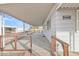 Covered patio with access to the backyard and a gated entry at 7648 E Holmes Ave, Mesa, AZ 85209