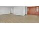 Open concept dining area with built-in hutch and wood flooring at 7648 E Holmes Ave, Mesa, AZ 85209