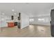 Spacious living area with laminate flooring and an open floor plan at 7648 E Holmes Ave, Mesa, AZ 85209