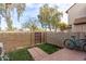 Small backyard with a gate and a paved patio area at 7905 W Thunderbird Rd # 309, Peoria, AZ 85381