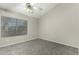 Bright bedroom with ceiling fan and window coverings at 7905 W Thunderbird Rd # 309, Peoria, AZ 85381