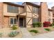 Brick townhouse exterior with landscaping and walkway at 7905 W Thunderbird Rd # 309, Peoria, AZ 85381