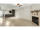 Living room with fireplace and tile flooring at 7905 W Thunderbird Rd # 309, Peoria, AZ 85381