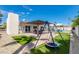 Landscaped backyard with patio and playset at 8219 N 3Rd Ave, Phoenix, AZ 85021