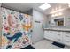 Bathroom with shower, nautical-themed decor at 8219 N 3Rd Ave, Phoenix, AZ 85021