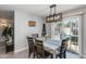Bright dining room features a table with chairs and access to the backyard at 8219 N 3Rd Ave, Phoenix, AZ 85021