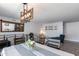 Dining area with a chandelier and view to the living room at 8219 N 3Rd Ave, Phoenix, AZ 85021