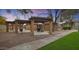 Outdoor community grilling area with a pergola, built-in grill and seating at 1051 S Dobson Rd # 165, Mesa, AZ 85202