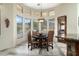 Breakfast nook with views and a rustic wooden table at 10630 E Cactus View Cir, Gold Canyon, AZ 85118