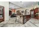 Gourmet kitchen with granite island and stainless steel appliances at 10630 E Cactus View Cir, Gold Canyon, AZ 85118