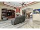 Open living area with built-in shelving and fireplace at 10630 E Cactus View Cir, Gold Canyon, AZ 85118