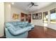 Living room with large sectional sofa and hardwood floors at 10630 E Cactus View Cir, Gold Canyon, AZ 85118