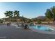 Stunning pool and patio with mountain backdrop; perfect for outdoor entertaining at 10630 E Cactus View Cir, Gold Canyon, AZ 85118