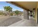 Covered patio overlooking a refreshing pool and mountain landscape at 10630 E Cactus View Cir, Gold Canyon, AZ 85118