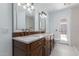 Double vanity bathroom with modern fixtures and plenty of storage at 10826 W Loma Blanca Dr, Sun City, AZ 85351