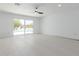 Spacious dining area with sliding glass doors and tile flooring at 10826 W Loma Blanca Dr, Sun City, AZ 85351