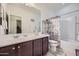 Clean bathroom with tub, shower, and updated vanity at 11047 E Tupelo Ave, Mesa, AZ 85212